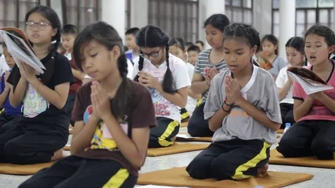 Students of Pieamsuwan school in Buddhist Camp, Students are praying Stock Footage 76909260
