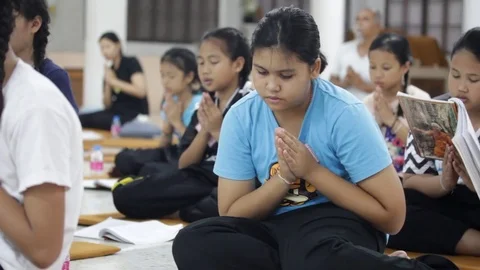 Students of Pieamsuwan school in Buddhist Camp, Students are praying Stock Footage 76909469