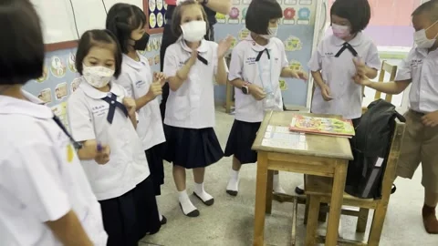 Students playing/dancing in a circle Stock Footage 192547604