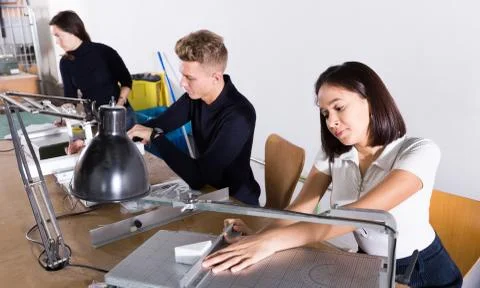 Students practicing architectural modeling in workshop 写真素材