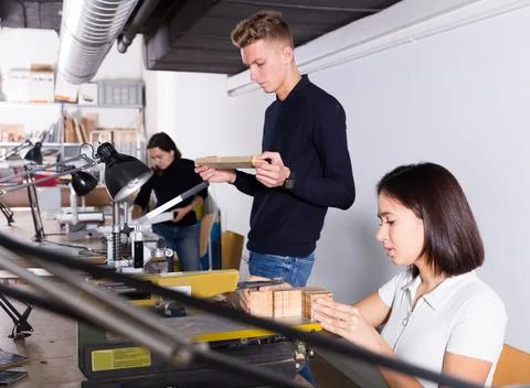 Students practicing architectural modeling in workshop Stock-Fotos