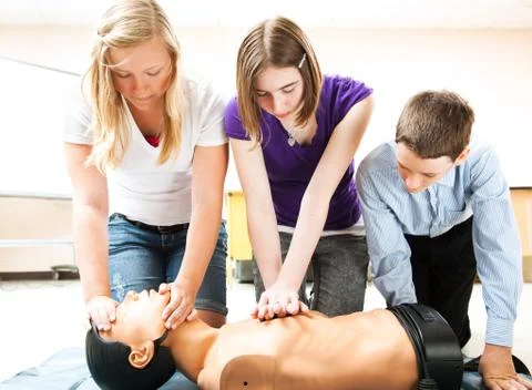 Students Practicing CPR Lifesaving Stock Photos