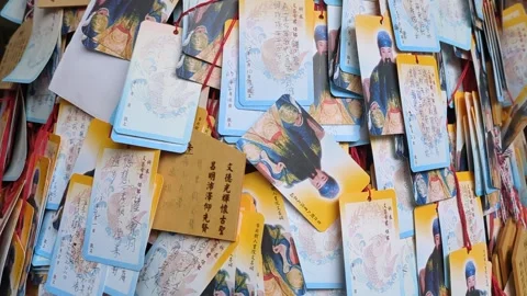 Student's prayers wishing tree at temple for good score in exam Stock Footage 267526379