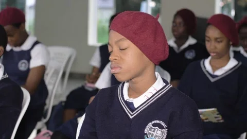 Students praying in the School fellowship Stock Footage 250815466