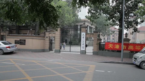 Students prepare for exams outside the school gate,China Stock Footage 36477223