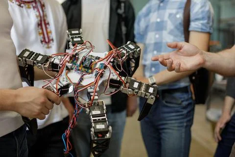 Students present hexapod robot prototype during STEM workshop Stock Photos