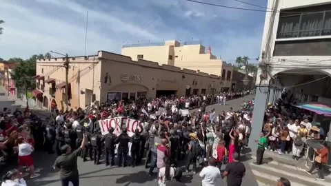 Students protest at military parade in Morelos following the murder of Claudia T Видео 345686839