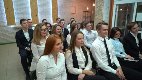 Students pulls his hands in the auditorium. 4 k Business People Seminar Stock Footage 84981777