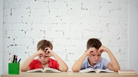 Students read a book in class Stock Footage 92069433