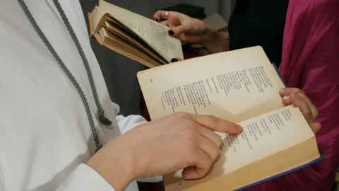 Students reading books  Stock Footage 86825828