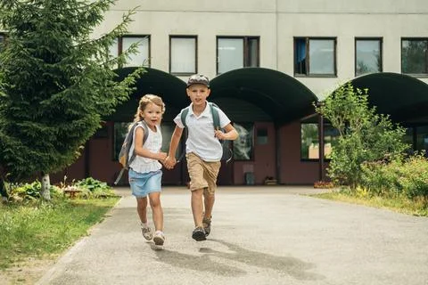 Students return to school. Stock Photos