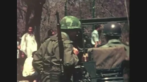 Students scatter during the Kent State shooting, filmed from Wright Hall 1970 Stock Footage 115348306