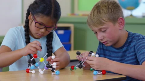 Students in school classroom build scien... | Stock Video | Pond5