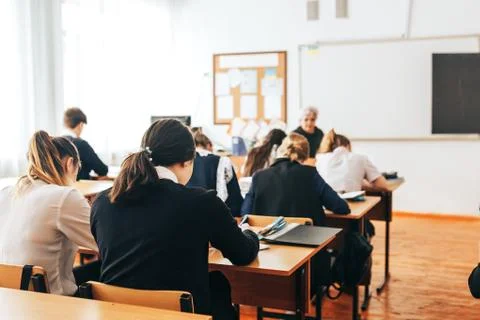 Students at school on lesson Stock Photos