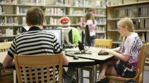 Students in school library Video stock 11412938