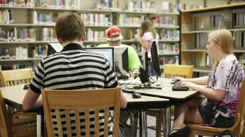 Students in school library Video stock 11412968