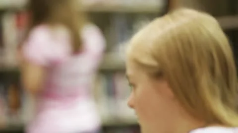 Students in school library Video stock 11623015
