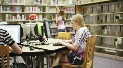 Students in school library Video stock 12191214