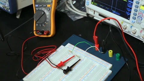 Students at school using electrical equipment in science class Stock Footage 123317969