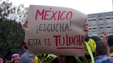 Students shout slogans in a march protest in Tlatelolco square. Stock Footage 53055594
