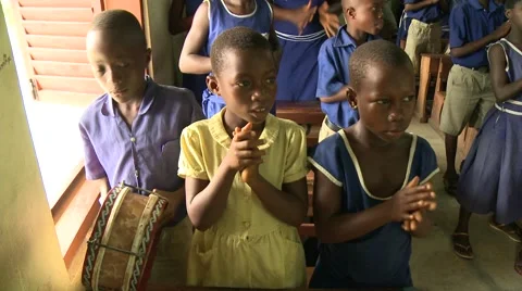 STUDENTS SINGING AND CLAPPING IN CLASS Stock Footage 60116246