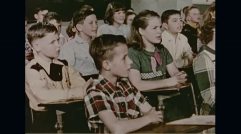Students singing song of Smokey the bear in school Stock Footage