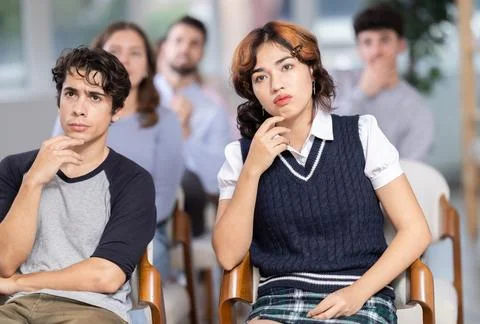 Students sit attentively in the classroom and listen to lectures Stock Photos