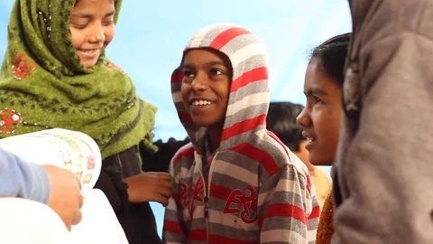 Students sit in front of teacher in Indian village school. Laughing Stock Footage 84778473