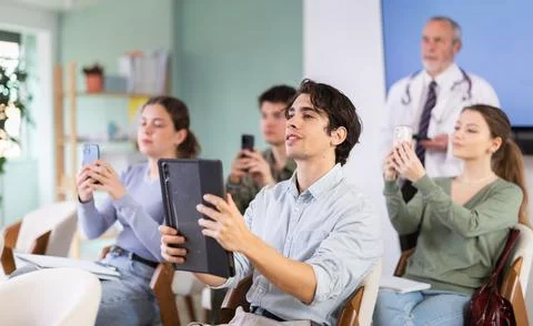 Students snuck the barcode during the lecture against the background of the Stock-Fotos