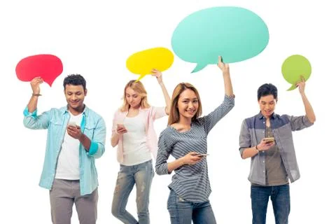Students with speech bubbles and gadgets Stock Photos