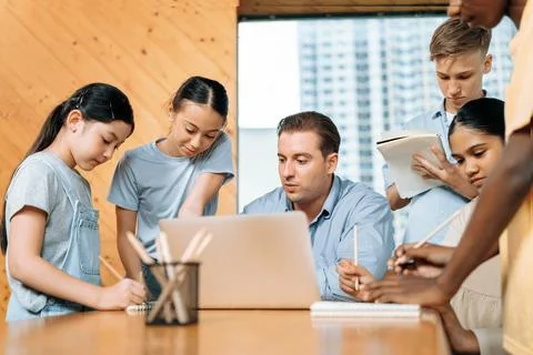 Students stand and separate to two group for taking note together. Edification. 스톡 사진