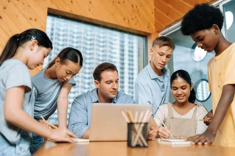 Students stand and separate to two group for taking note together. Edification. 스톡 사진