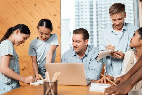Students stand and separate to two group for taking note together. Edification. 스톡 사진