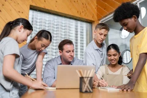 Students stand and separate to two group for taking note together. Edification. 스톡 사진