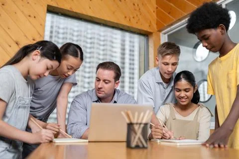Students stand and separate to two group for taking note together. Edification. 스톡 사진