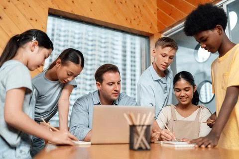 Students stand and separate to two group for taking note together. Edification. 스톡 사진