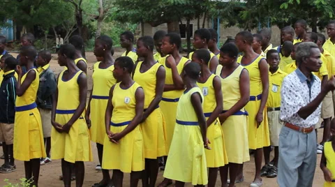 STUDENTS STANDING AT MORNING ASSEMBLY Stock Footage 60115724