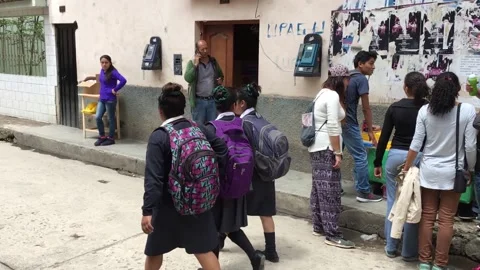 Students Standing outside and walking past local University in Cajamarca, Peru Stock Footage 288218182