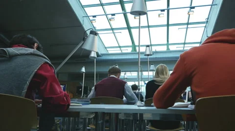 Students study in modern library 4K Video stock 47001173