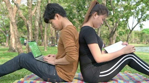 Students study in park. Stock Footage 92285378