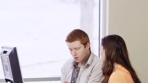 Students studying and taking notes together Stock Footage 80227318