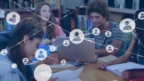 Students studying around laptop, overlay appearing on laptop expanding user Video stock 330793661