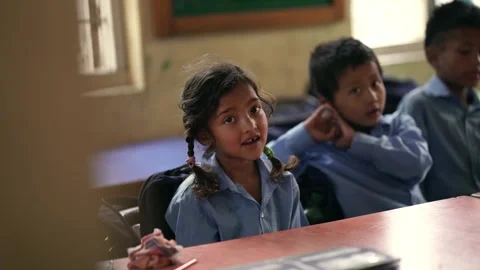 Students studying books in a classroom of a government school in Nepal Stock Footage 285295142