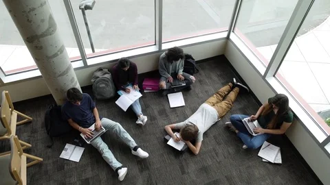 Students studying on floor 動画素材 83398950