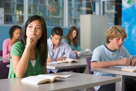 Students studying in geography class Stock Photos
