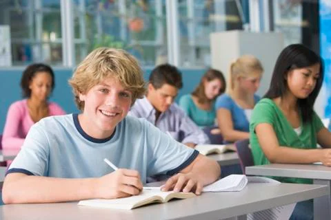 Students studying in geography class Stock Photos