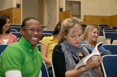 Students studying in lecture hall Stock Photos