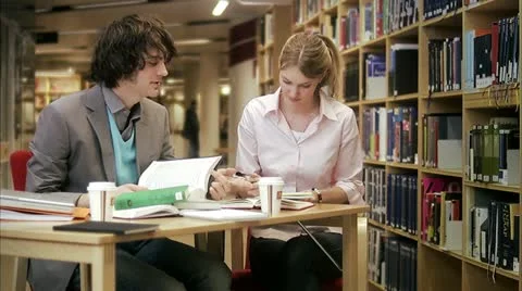 Students studying in a library Stock Footage 11289710