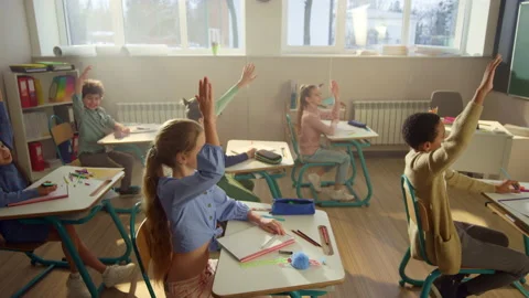 Students studying in school class. Cheerful kids having lesson in auditorium Stock Footage 154970975