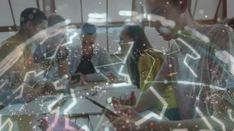 Students studying at table, right student scrolling and starting network overlay Stock Footage 333425500